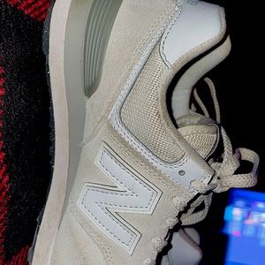 New Balance Shoes you can use them as running/ athletic shoes and grayish color.